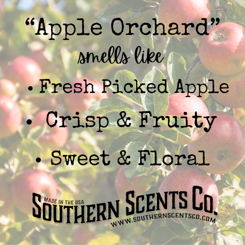 Apples on a tree with text describing the scent of 'Apple Orchard' and branding information.
