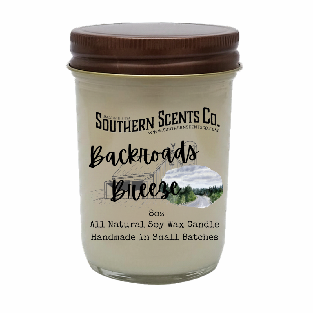 Candle jar with 'Southern Scents Co.' label and 'Backroads Breeze' description on a white background