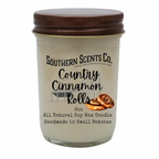 Glass candle jar with brown lid labeled 'Southern Scents Co. Country Cinnamon Rolls' on a white background