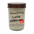 Candle jar with 'Southern Scents Co.' label and 'Country Strawberries' description on a white background