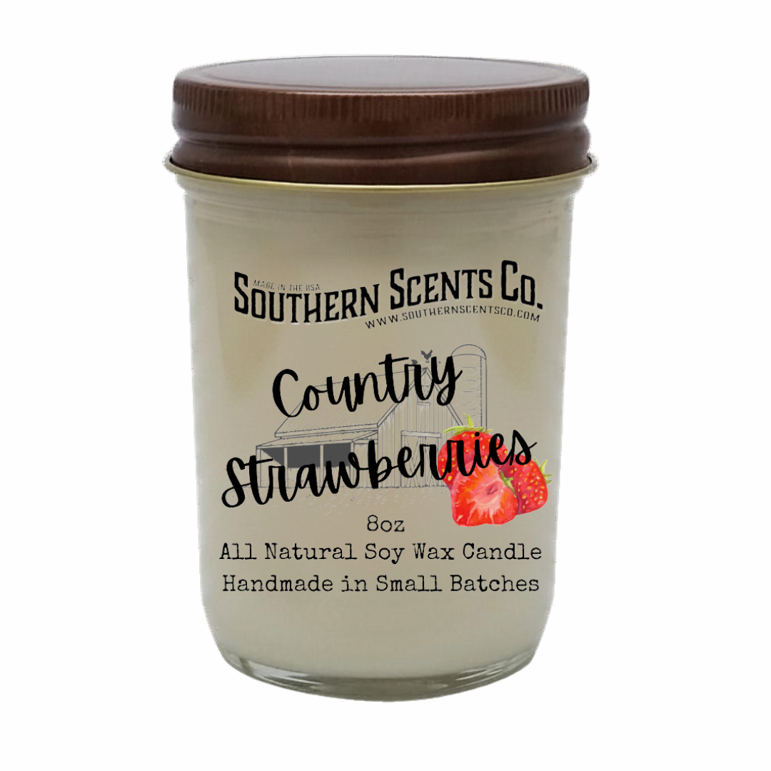 Candle jar with 'Southern Scents Co.' label and 'Country Strawberries' description on a white background