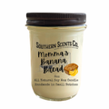 A 8oz soy wax candle in a clear glass jar with a black screw-on lid. The label reads 'Southern Scents Co.